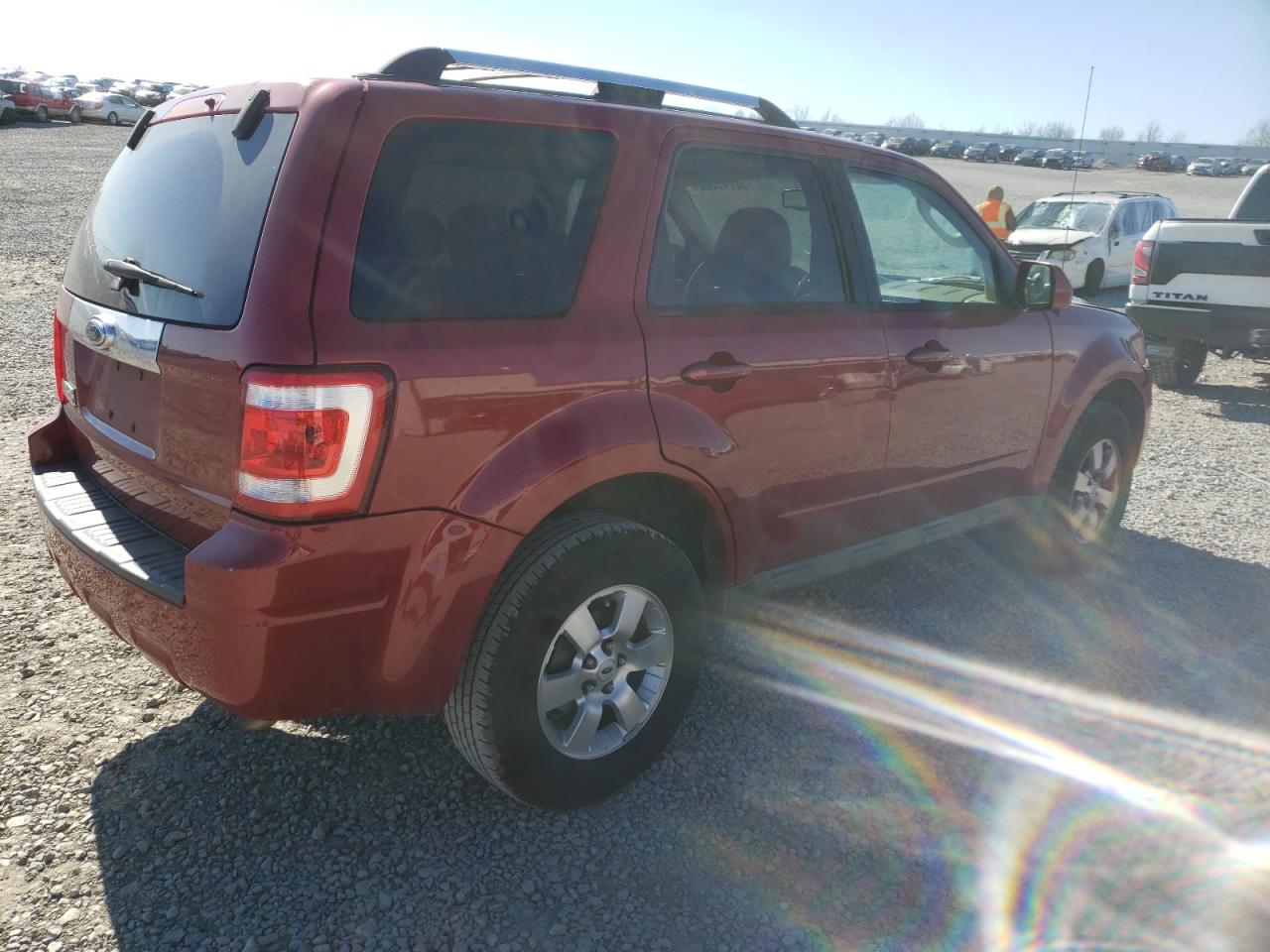 Photo 4 from auction – 2009 FORD ESCAPE LIM with VIN 1FMCU04789KB47964
