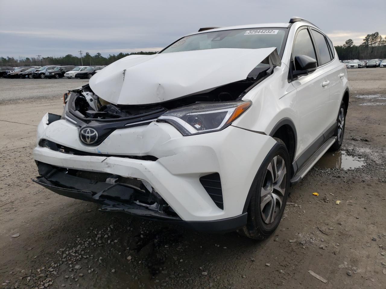 Photo 2 from auction – 2017 TOYOTA RAV4 LE with VIN JTMZFREV4HJ132604