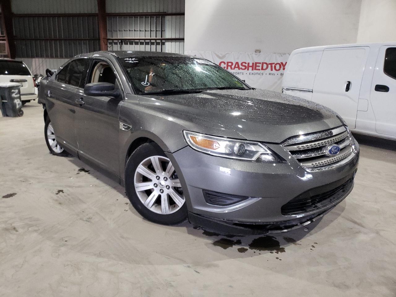 FORD TAURUS SE 2011 with VIN 1FAHP2DWXBG159021 - Photo from auction