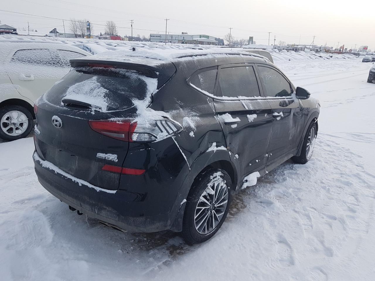Photo 4 from auction – 2019 HYUNDAI TUCSON LIM with VIN KM8J3CAL7KU024308