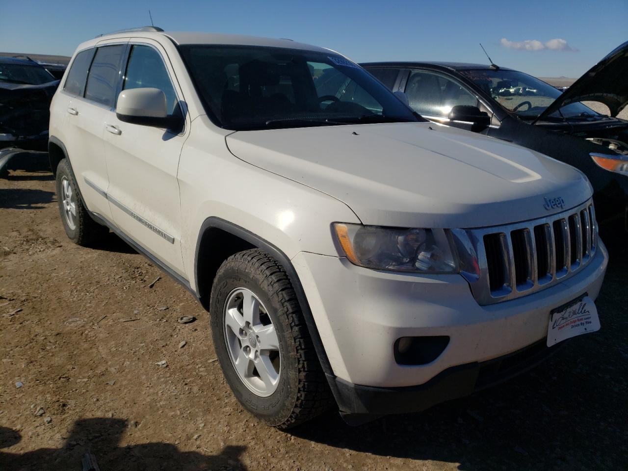 JEEP GRAND CHER 2011 with VIN 1J4RR4GG8BC518540 - Photo from auction