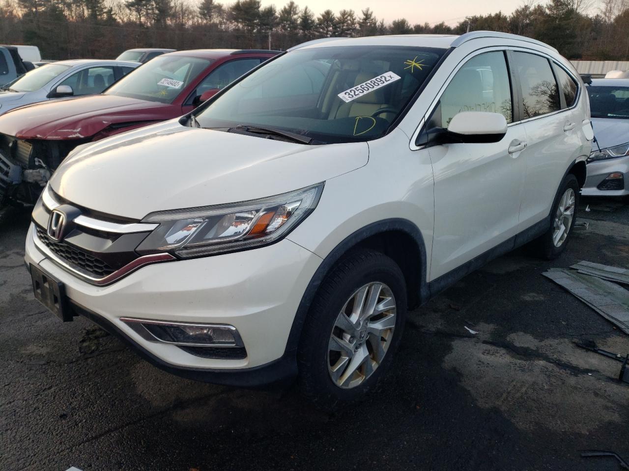 Photo 2 from auction – 2016 HONDA CR-V EXL with VIN 5J6RM4H76GL017246