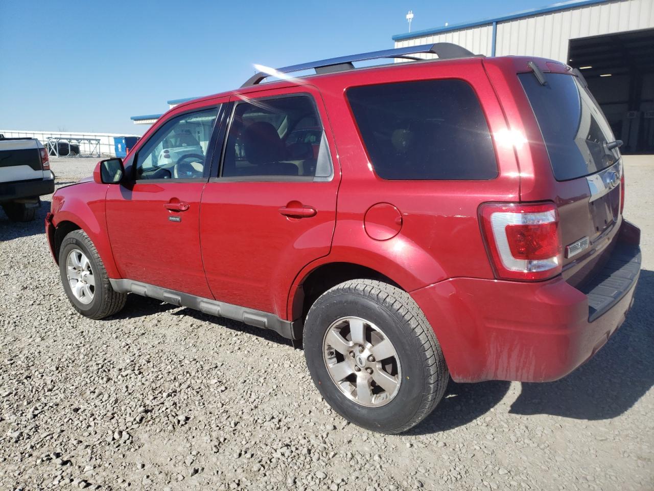 Photo 3 from auction – 2009 FORD ESCAPE LIM with VIN 1FMCU04789KB47964