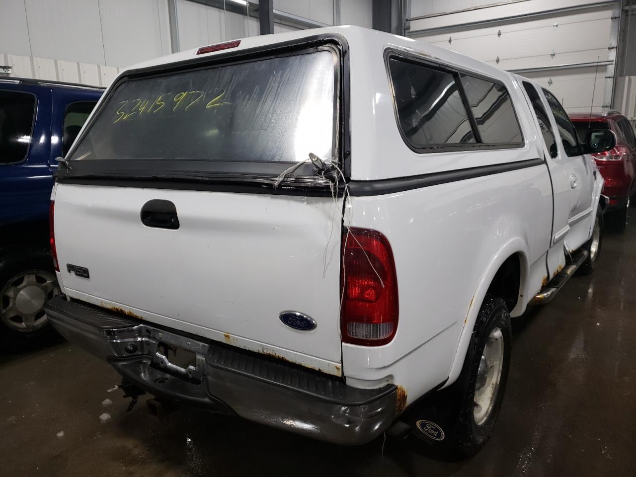 Photo 4 from auction – 2001 FORD F150 with VIN 2FTRX18LX1CA86449