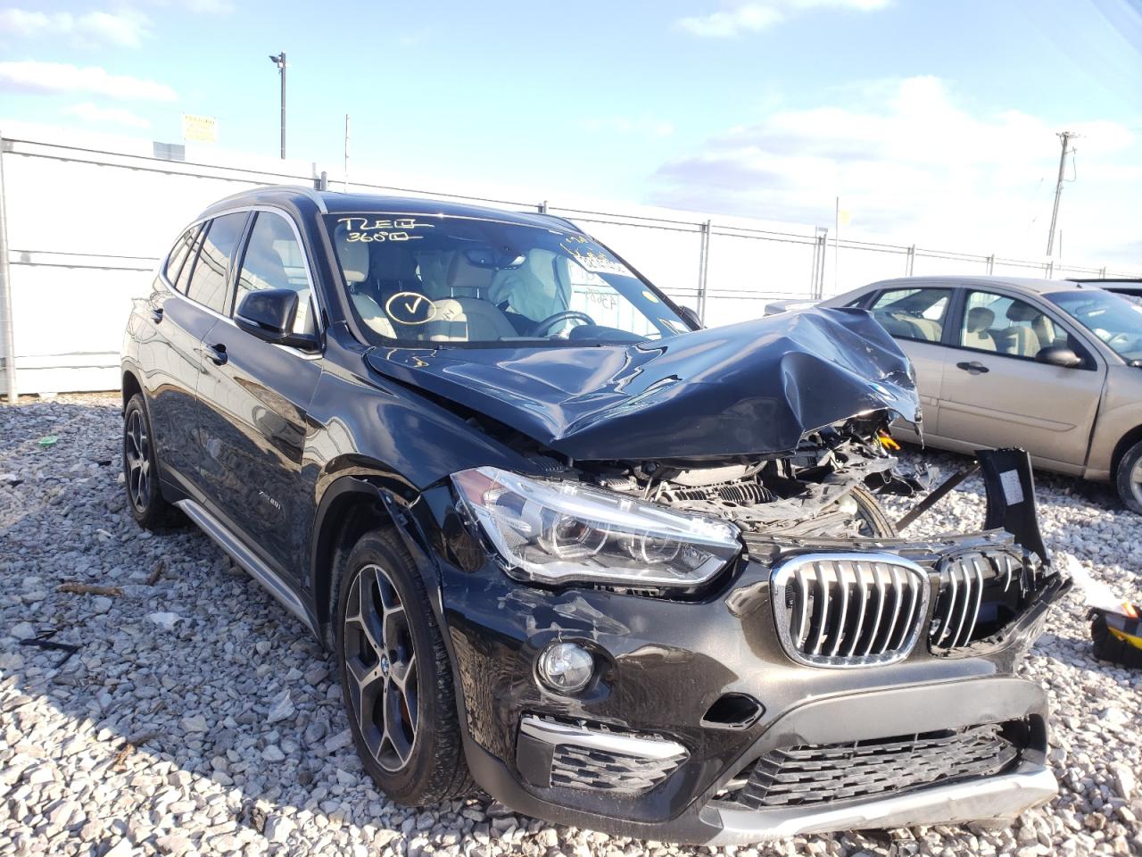 BMW X1 XDRIVE2 2017 with VIN WBXHT3C30H5F86446 - Photo from auction