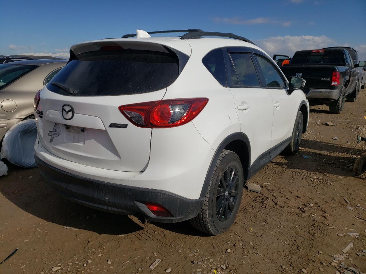 Photo 4 from auction – 2014 MAZDA CX-5 TOURI with VIN JM3KE4CY3E0393607