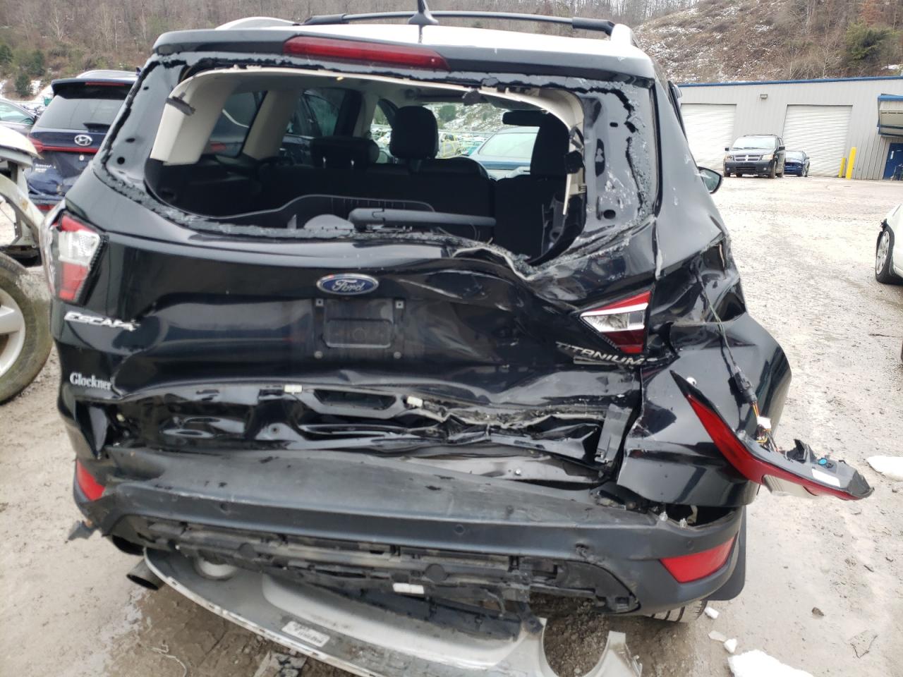 Photo 9 from auction – 2018 FORD ESCAPE TIT with VIN 1FMCU9J93JUB08606