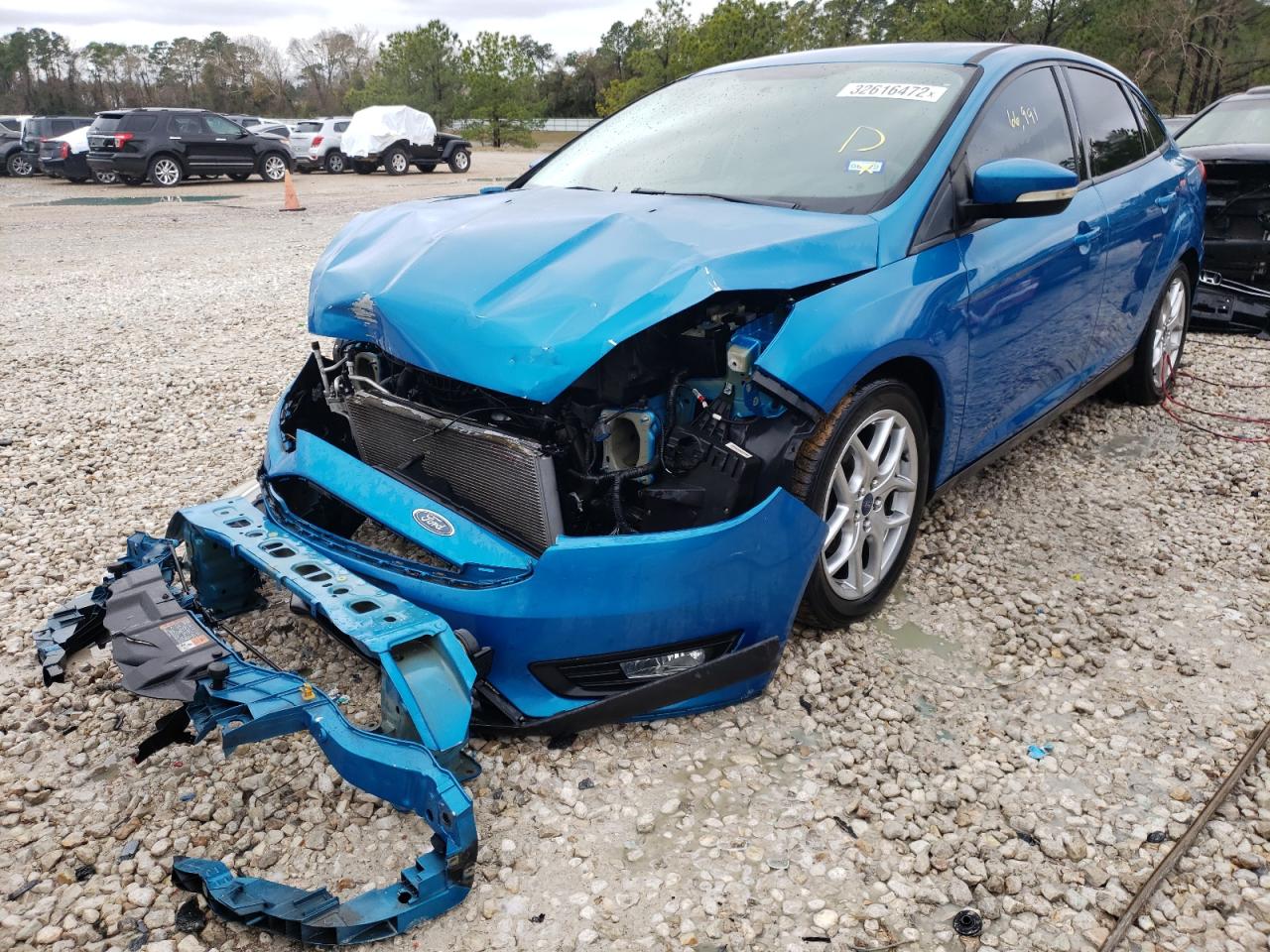 Photo 2 from auction – 2015 FORD FOCUS SE with VIN 1FADP3F28FL296471