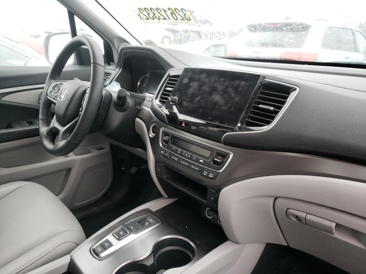 Photo 9 from auction – 2021 HONDA PILOT EXL with VIN 5FNYF6H59MB081530
