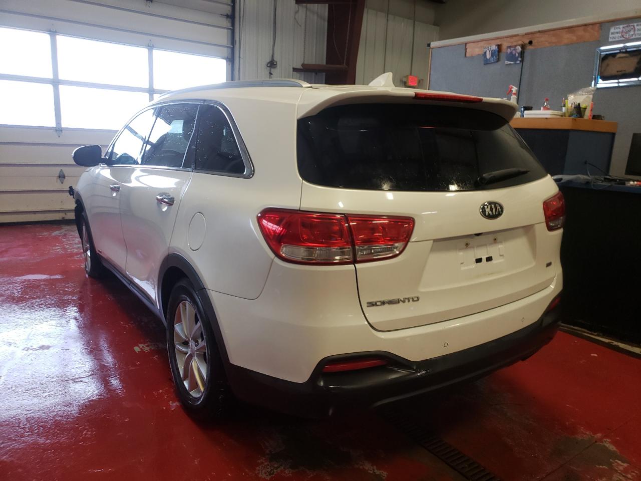 Photo 3 from auction – 2016 KIA SORENTO LX with VIN 5XYPGDA30GG053280