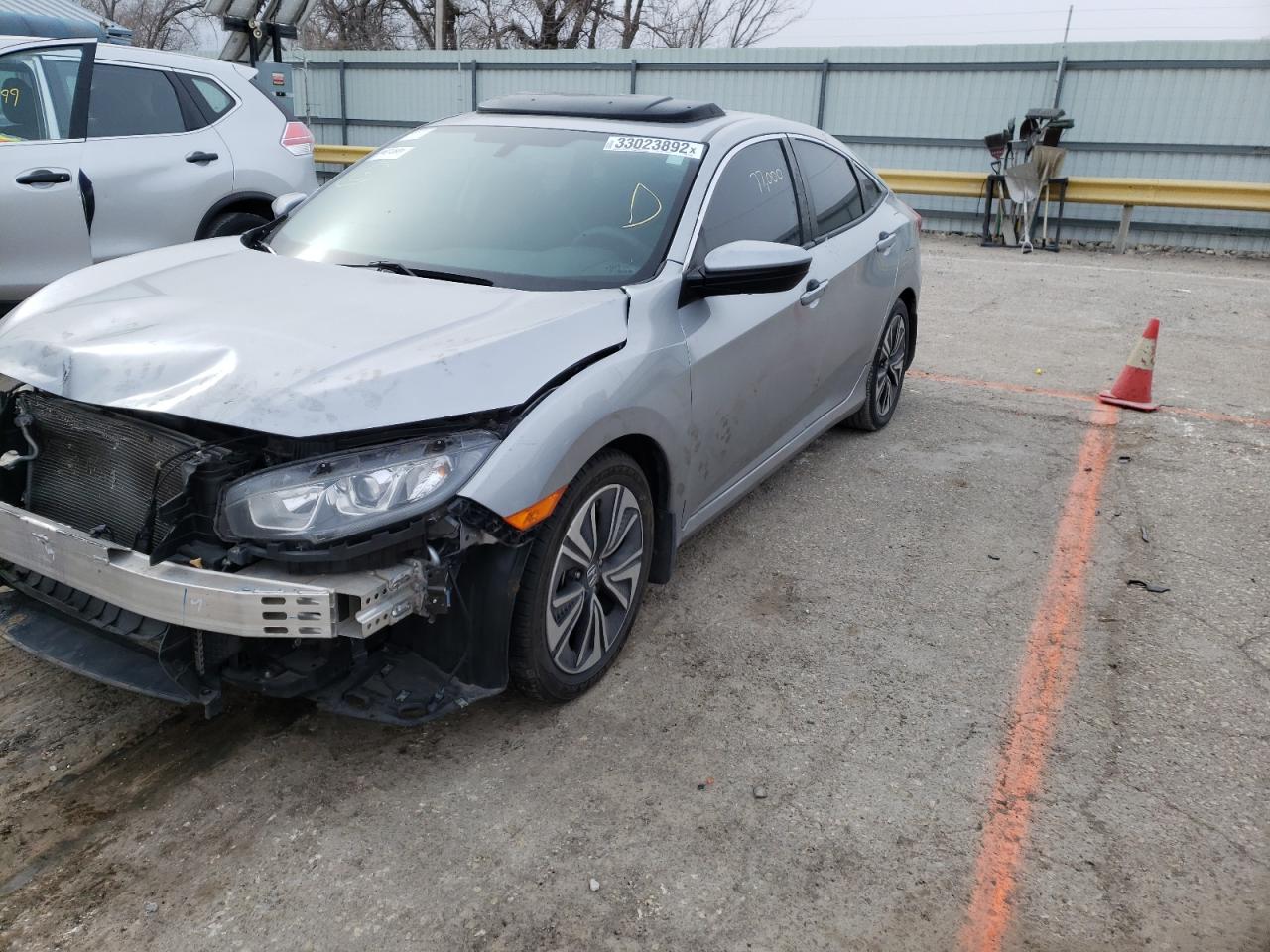 Photo 2 from auction – 2016 HONDA CIVIC EX with VIN 19XFC1F31GE027590
