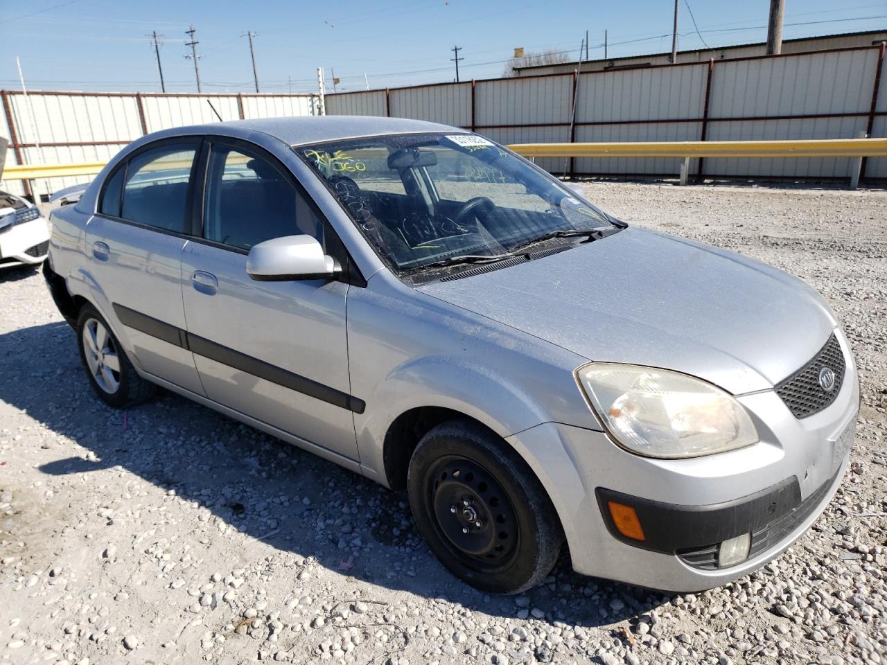 KIA RIO BASE 2009 with VIN KNADE223096556449 - Photo from auction