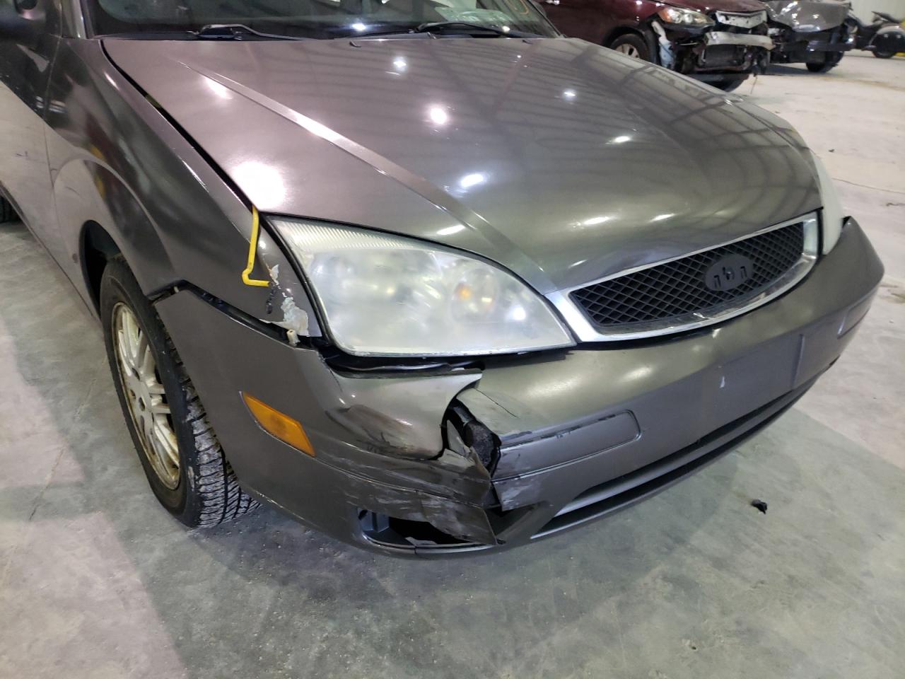 Photo 9 from auction – 2007 FORD FOCUS ZX4 with VIN 1FAHP34N57W117155