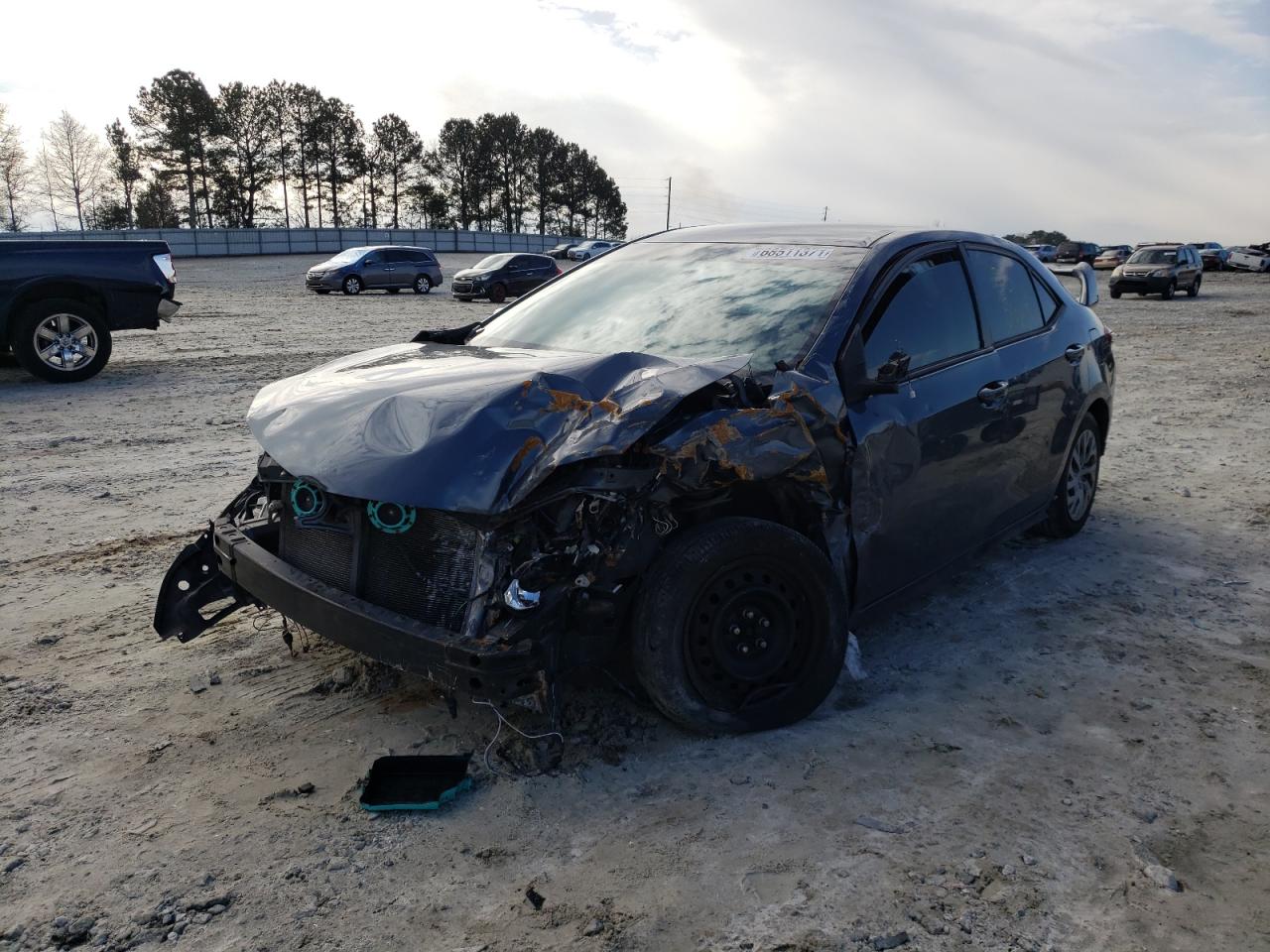 Photo 2 from auction – 2014 TOYOTA COROLLA with VIN 2T1BURHE5EC119841