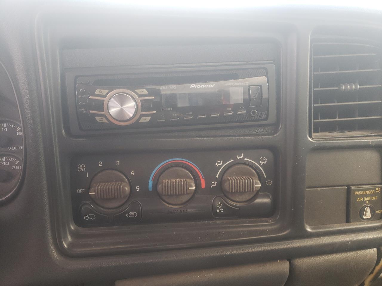 Photo 9 from auction – 1999 GMC NEW SIERRA with VIN 1GTEC14WXXE500004