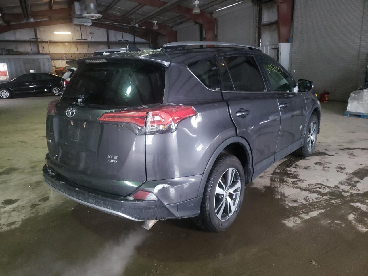 Photo 4 from auction – 2017 TOYOTA RAV4 XLE with VIN 2T3RFREV2HW578428
