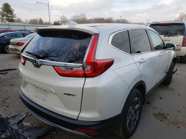 Photo 4 from auction – 2017 HONDA CRV with VIN 2HKRW2H51HH662265