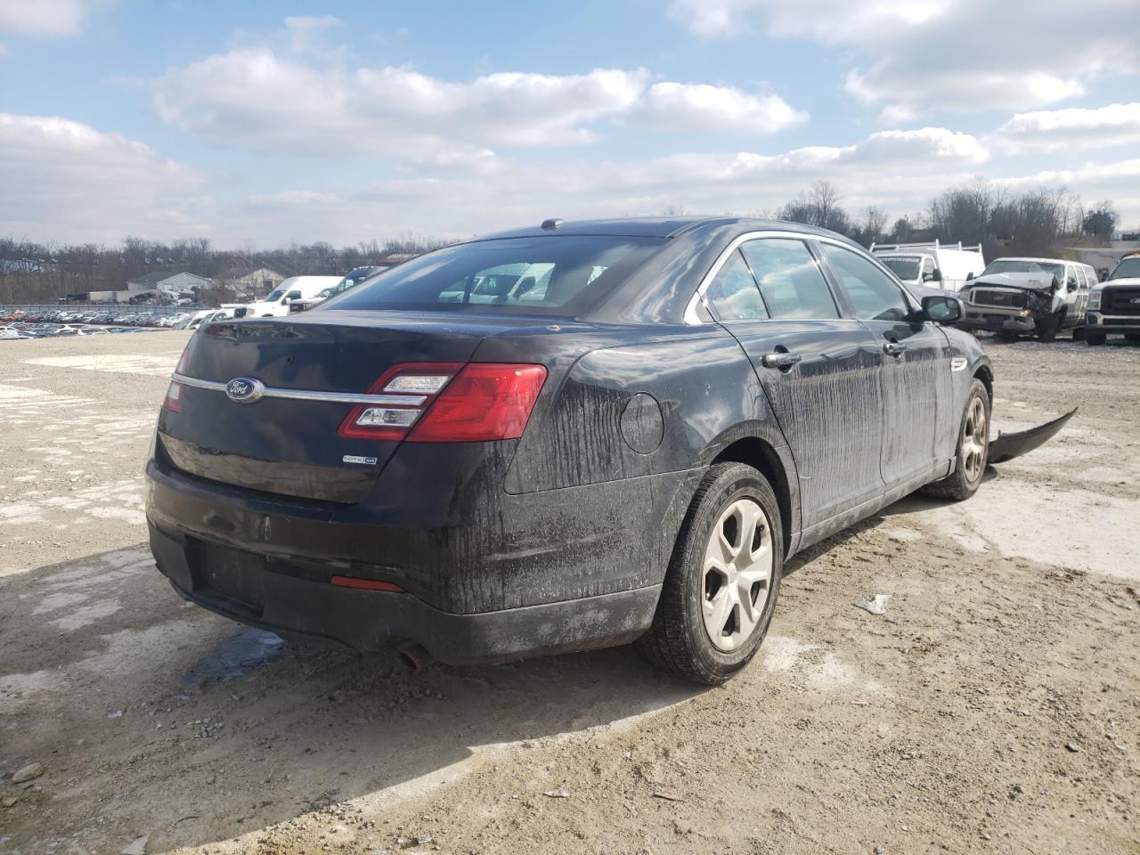 Photo 4 from auction – 2014 FORD TAURUS POL with VIN 1FAHP2MK1EG105639