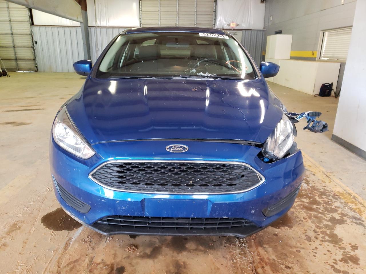 Photo 9 from auction – 2018 FORD FOCUS SE with VIN 1FADP3F26JL212611