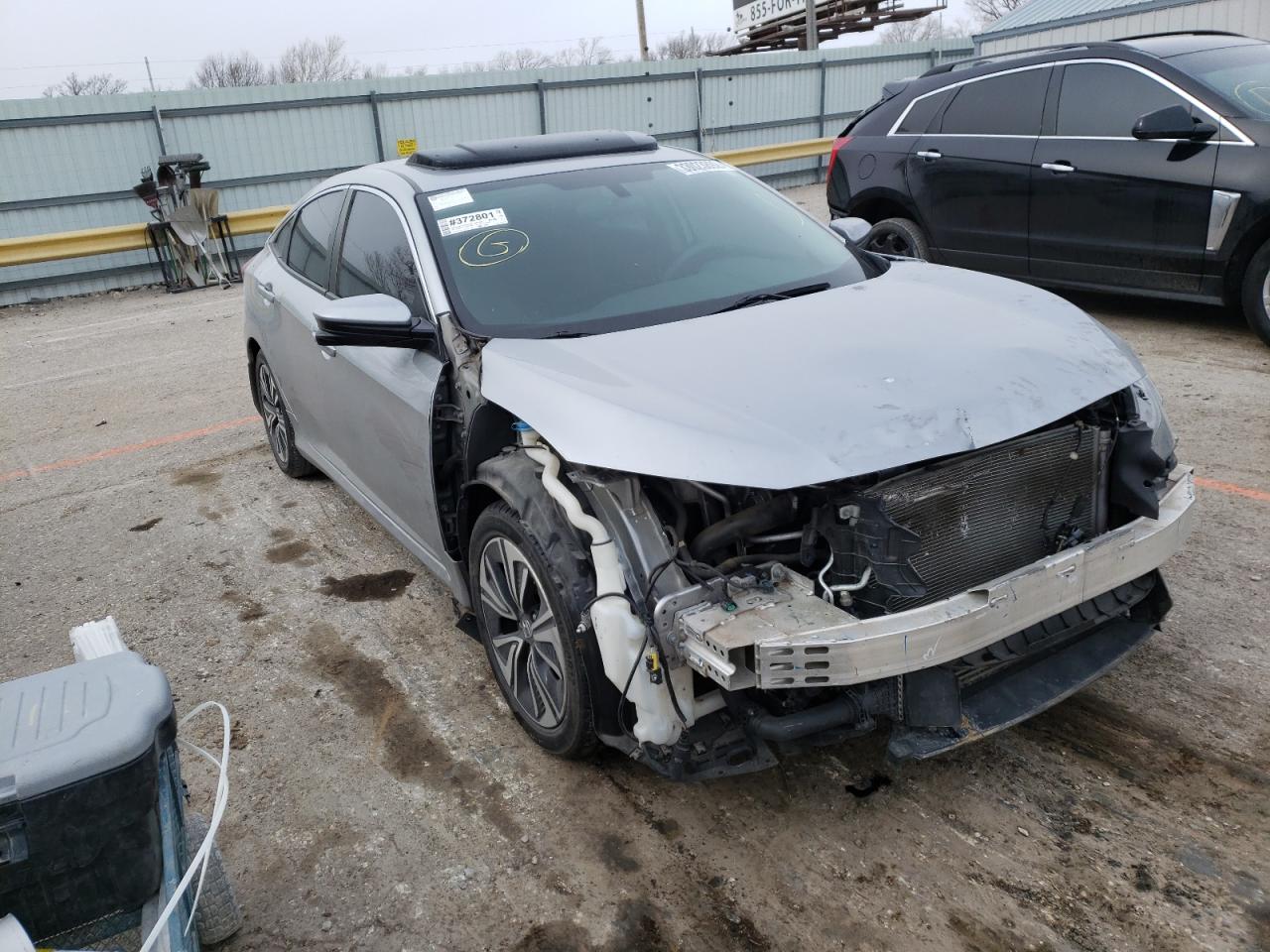 HONDA CIVIC EX 2016 with VIN 19XFC1F31GE027590 - Photo from auction