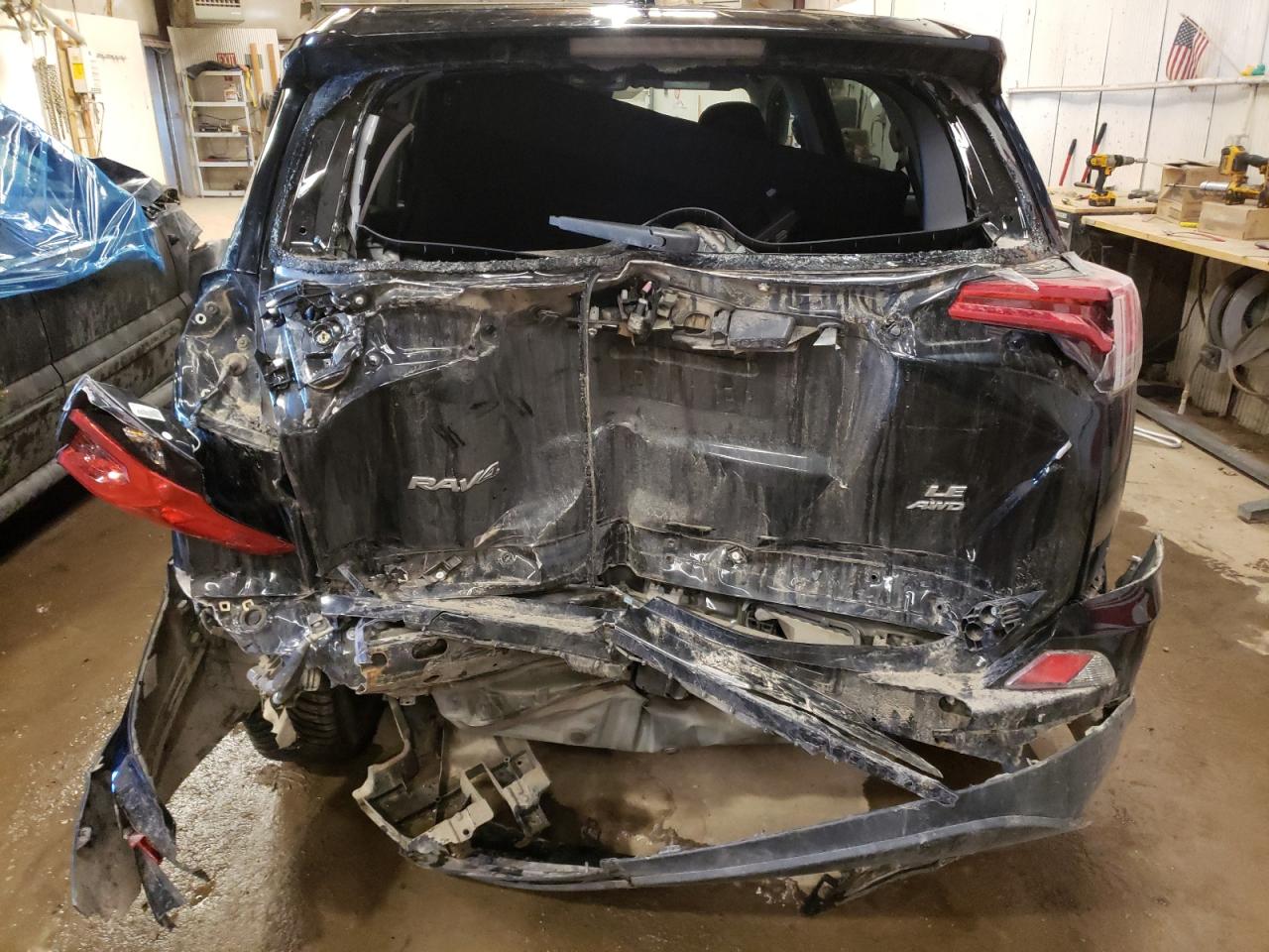 Photo 9 from auction – 2018 TOYOTA RAV4 LE with VIN 2T3BFREV7JW707805