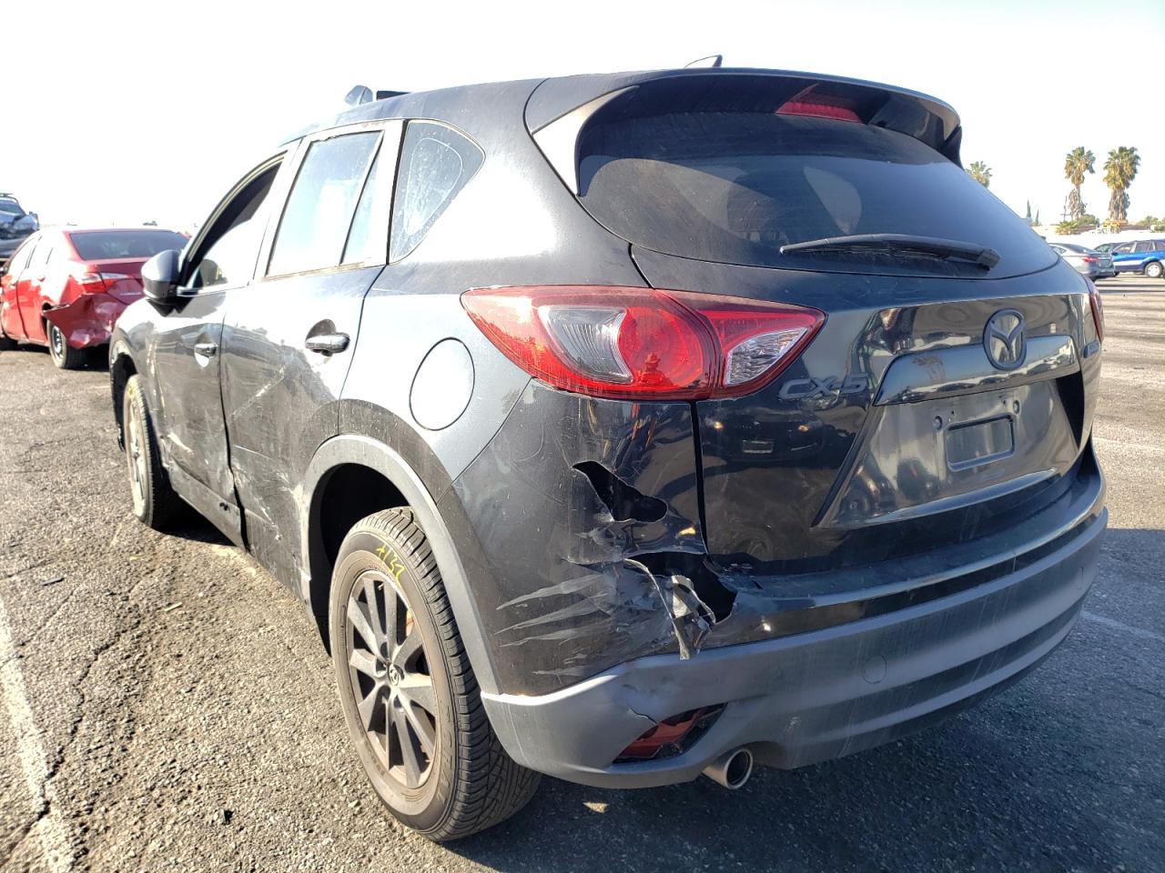 Photo 13 from auction – 2013 MAZDA CX-5 SPORT with VIN JM3KE2BE0D0143090