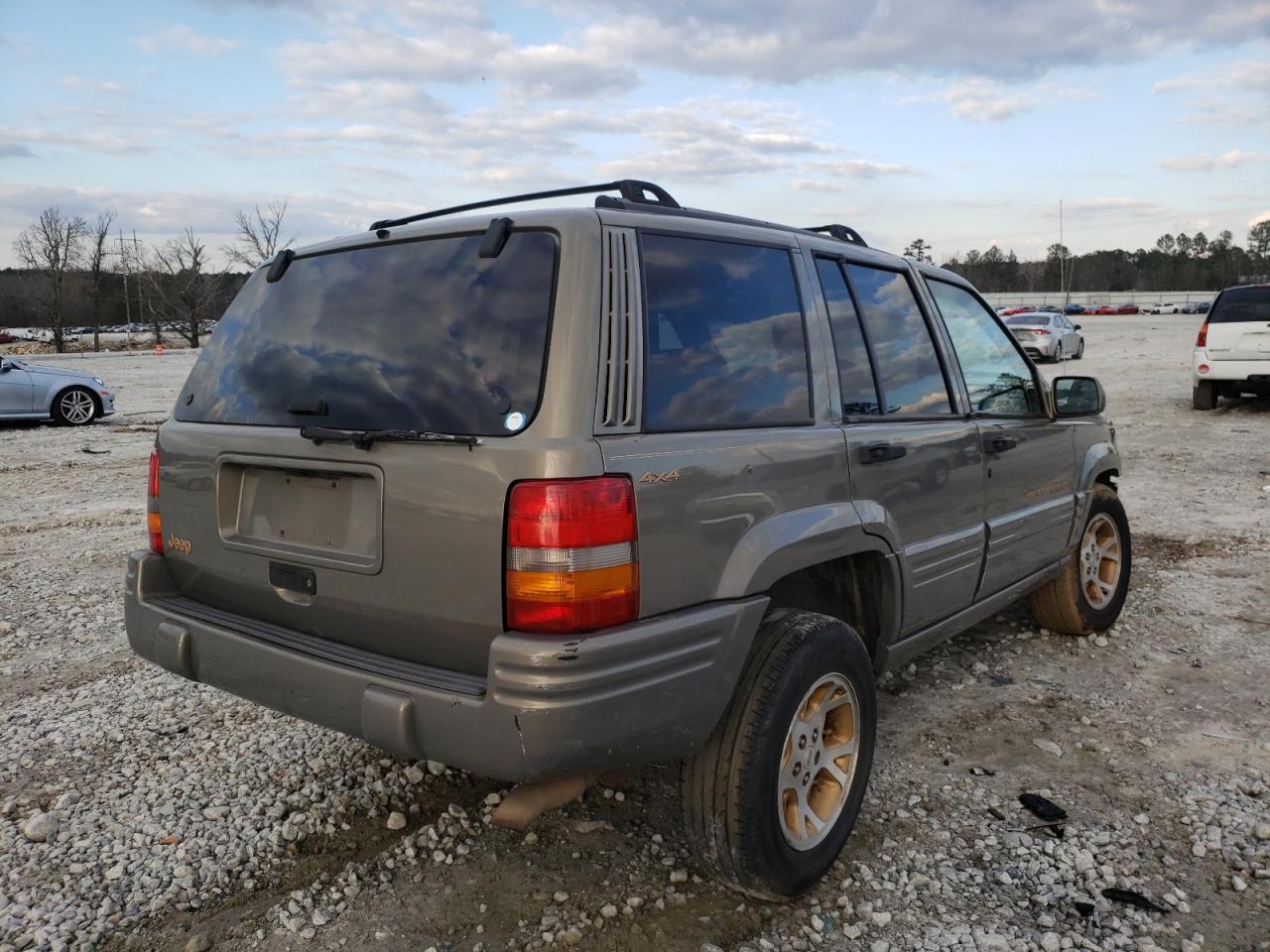 Photo 4 from auction – 1998 JEEP GRAND CHER with VIN 1J4GZ78Y7WC191313