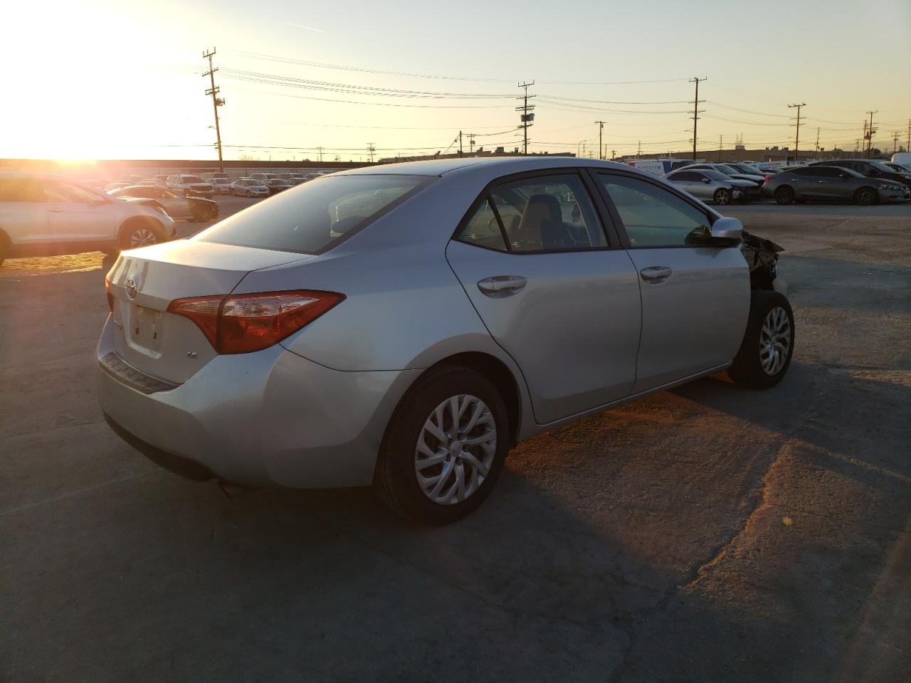 Photo 4 from auction – 2018 TOYOTA COROLLA L with VIN 5YFBURHE2JP798400