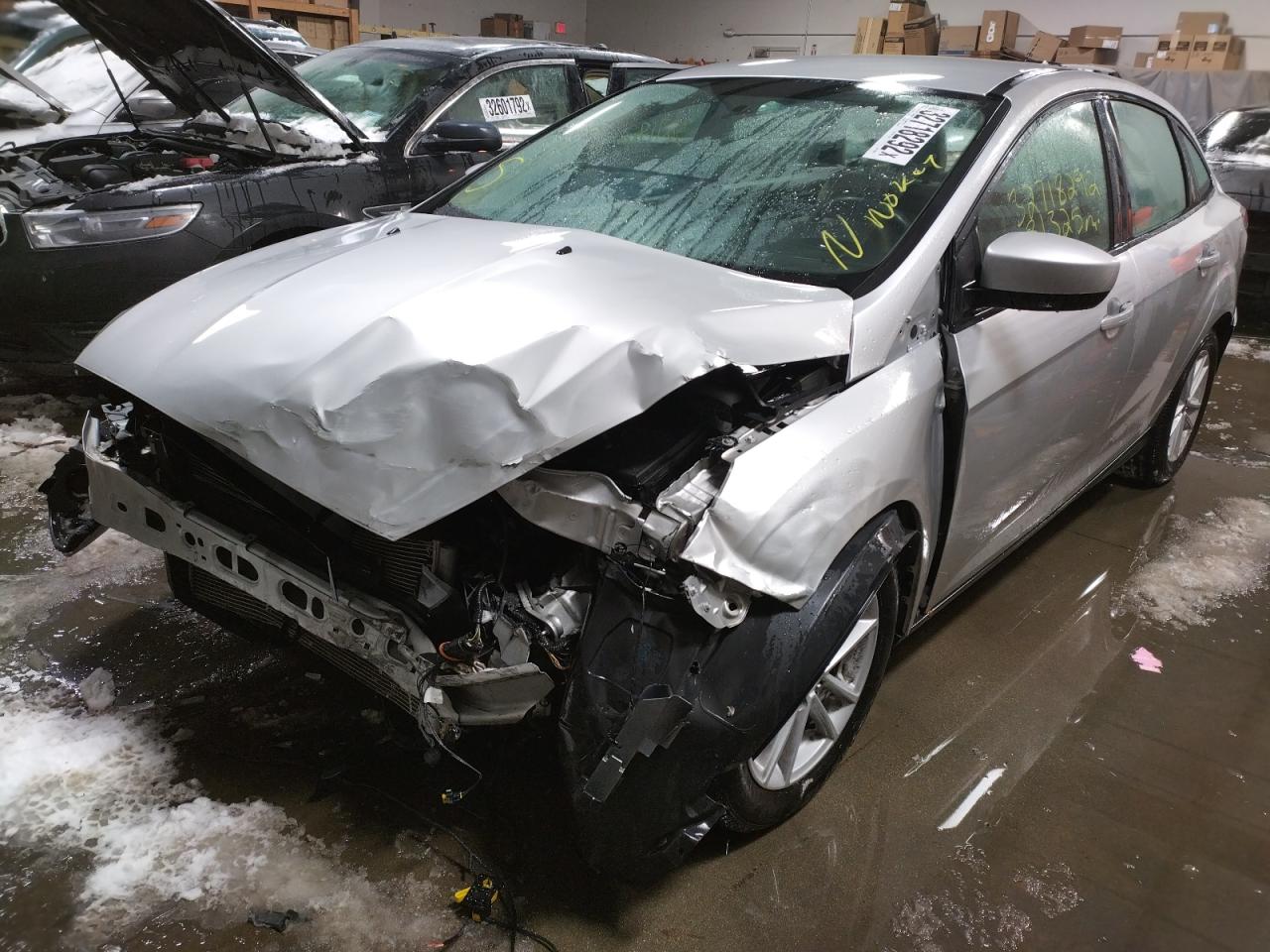 Photo 2 from auction – 2018 FORD FOCUS SE with VIN 1FADP3F21JL256208