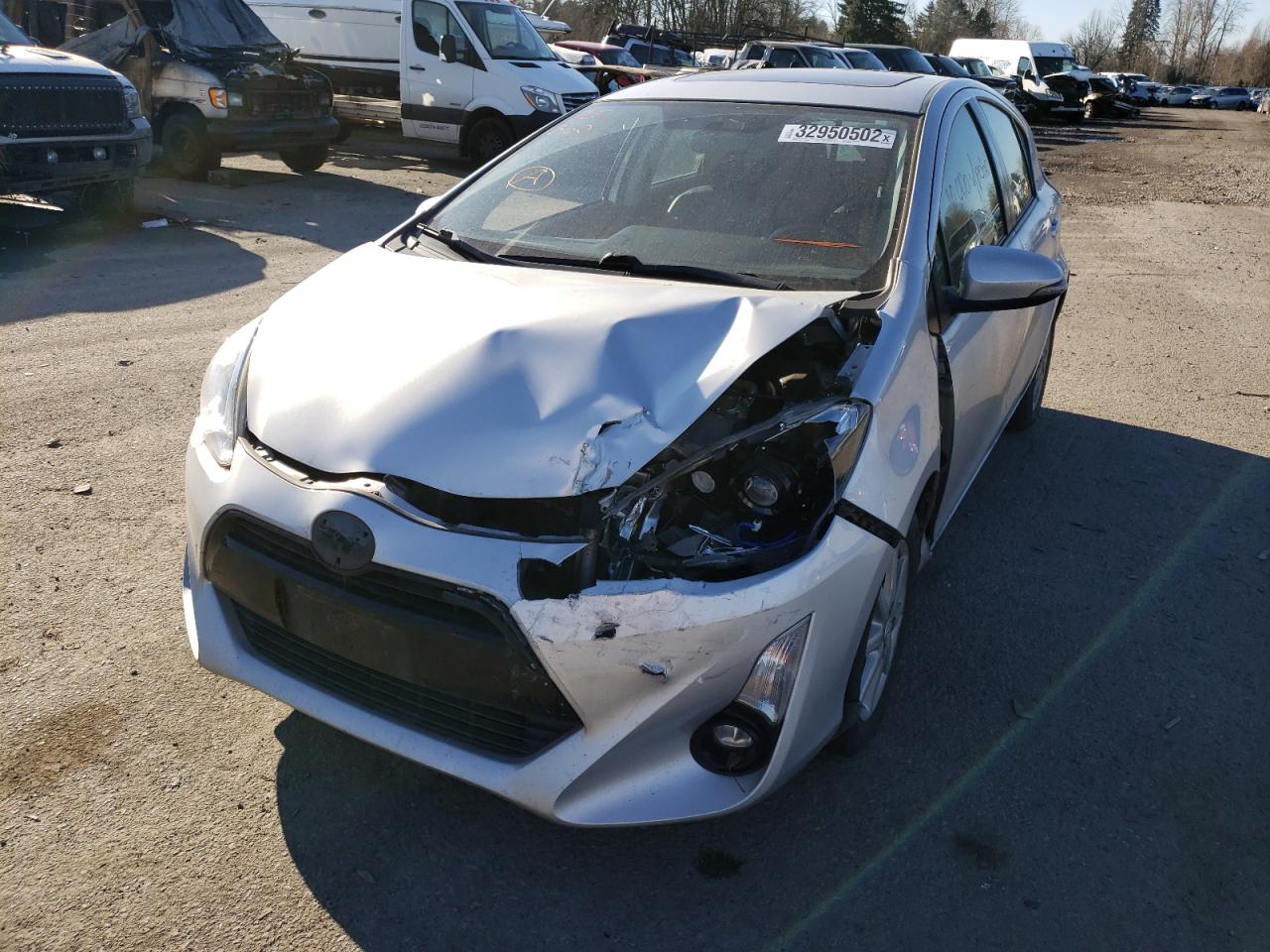 Photo 9 from auction – 2015 TOYOTA PRIUS C with VIN JTDKDTB31F1101640