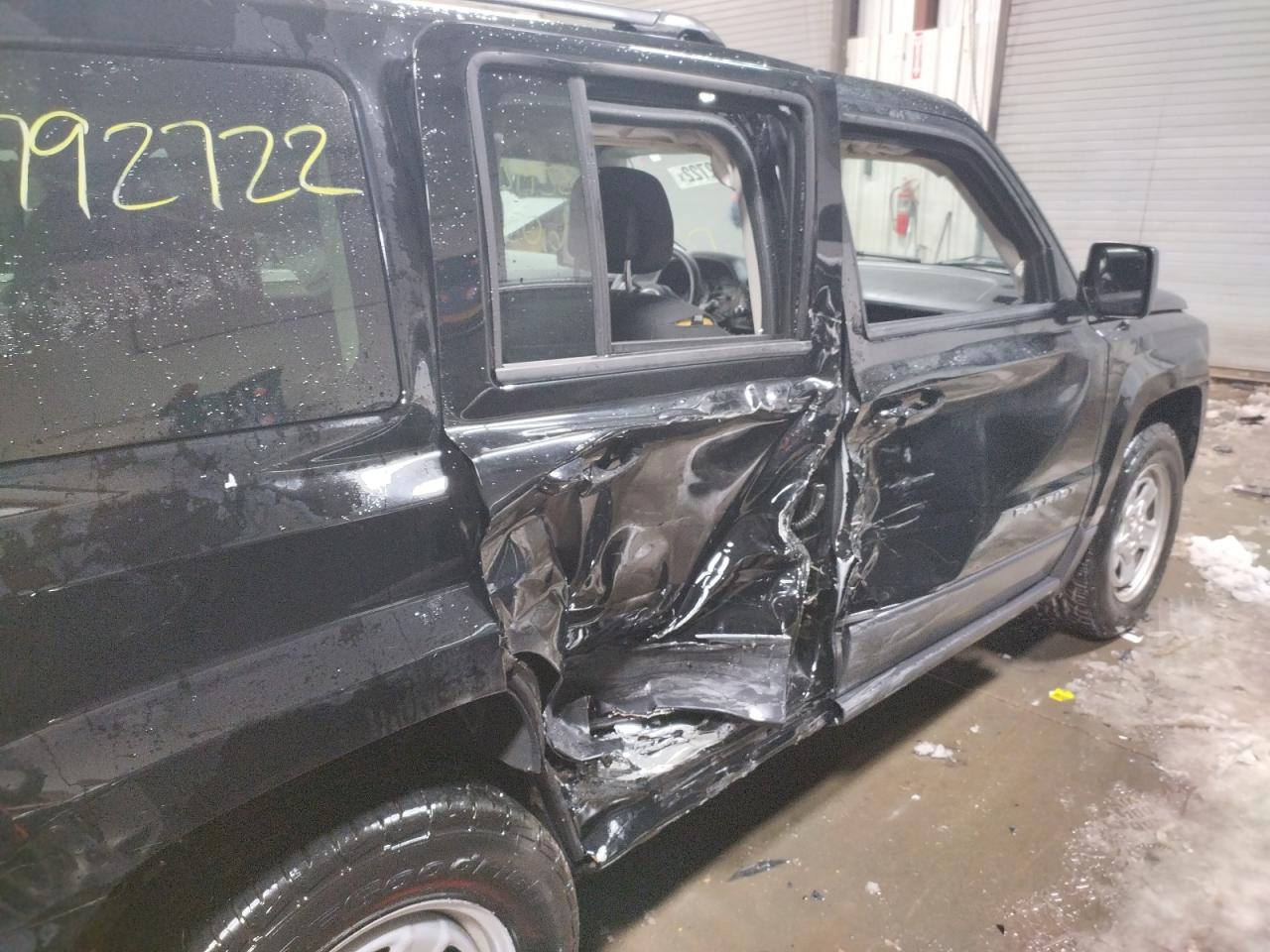 Photo 9 from auction – 2014 JEEP PATRIOT SP with VIN 1C4NJPBA7ED652177