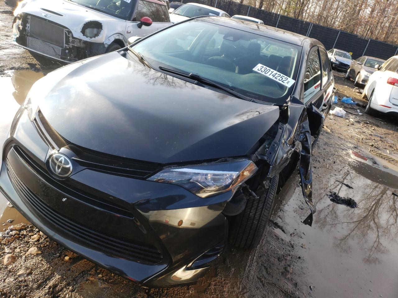 Photo 2 from auction – 2017 TOYOTA COROLLA L with VIN 5YFBURHEXHP572194