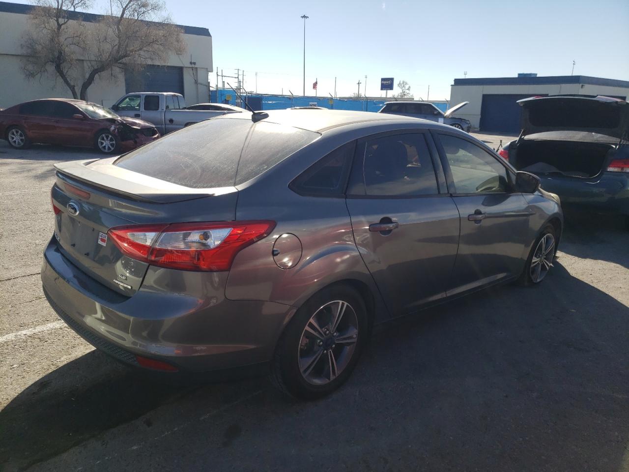 Photo 4 from auction – 2014 FORD FOCUS SE with VIN 1FADP3F27EL406375