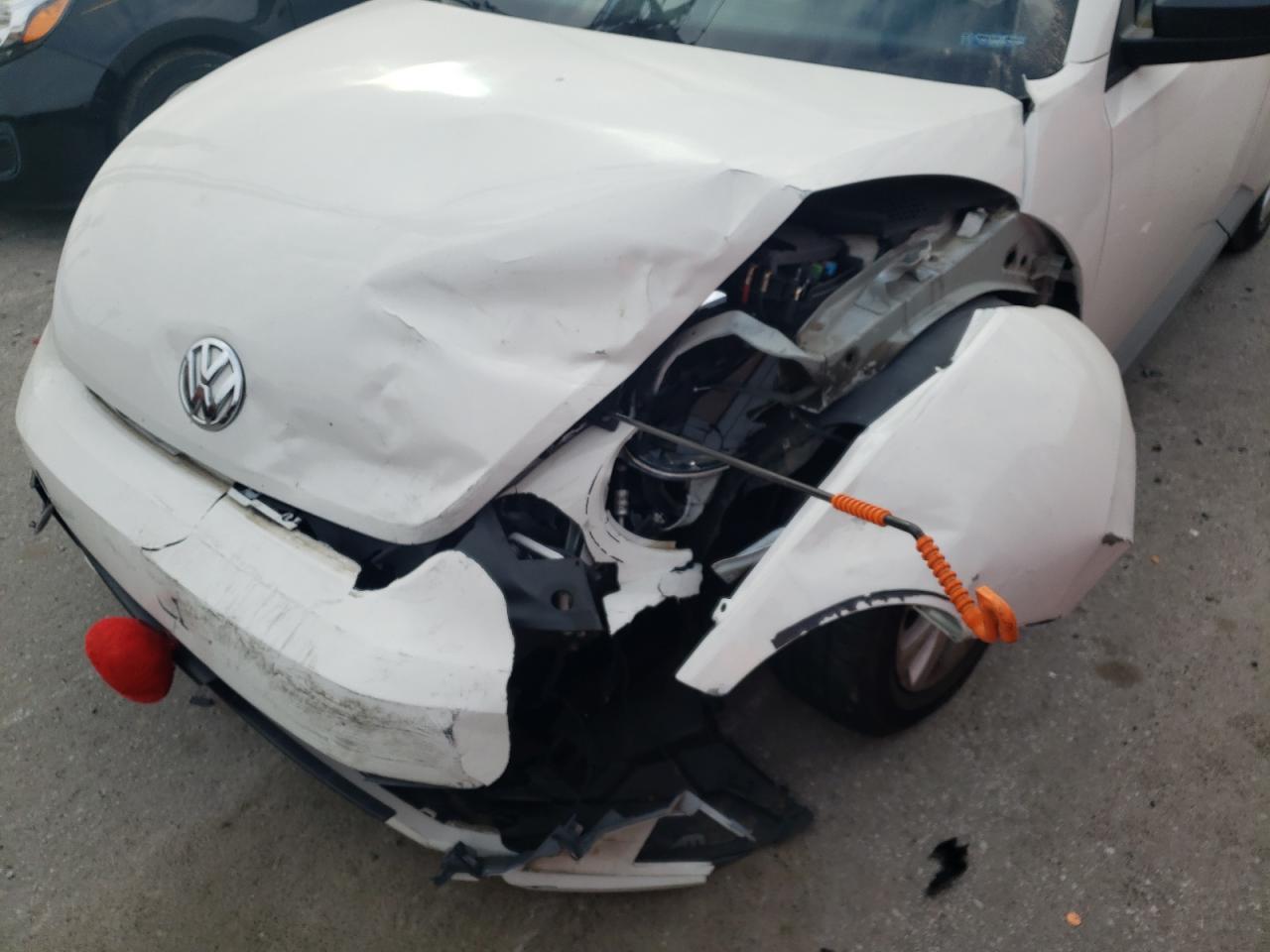Photo 9 from auction – 2013 VOLKSWAGEN BEETLE with VIN 3VWFP7AT3DM613222