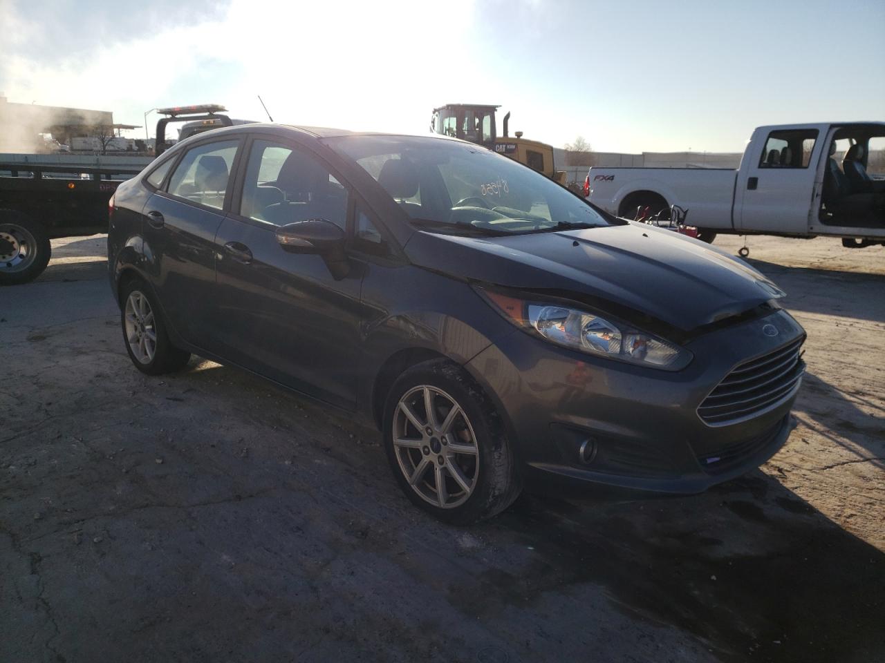 FORD FIESTA SE 2015 with VIN 3FADP4BJ0FM128843 - Photo from auction
