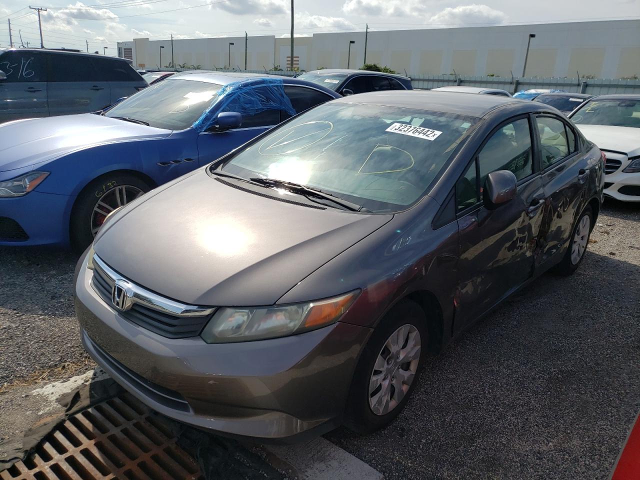 Photo 2 from auction – 2012 HONDA CIVIC LX with VIN 19XFB2F59CE085094