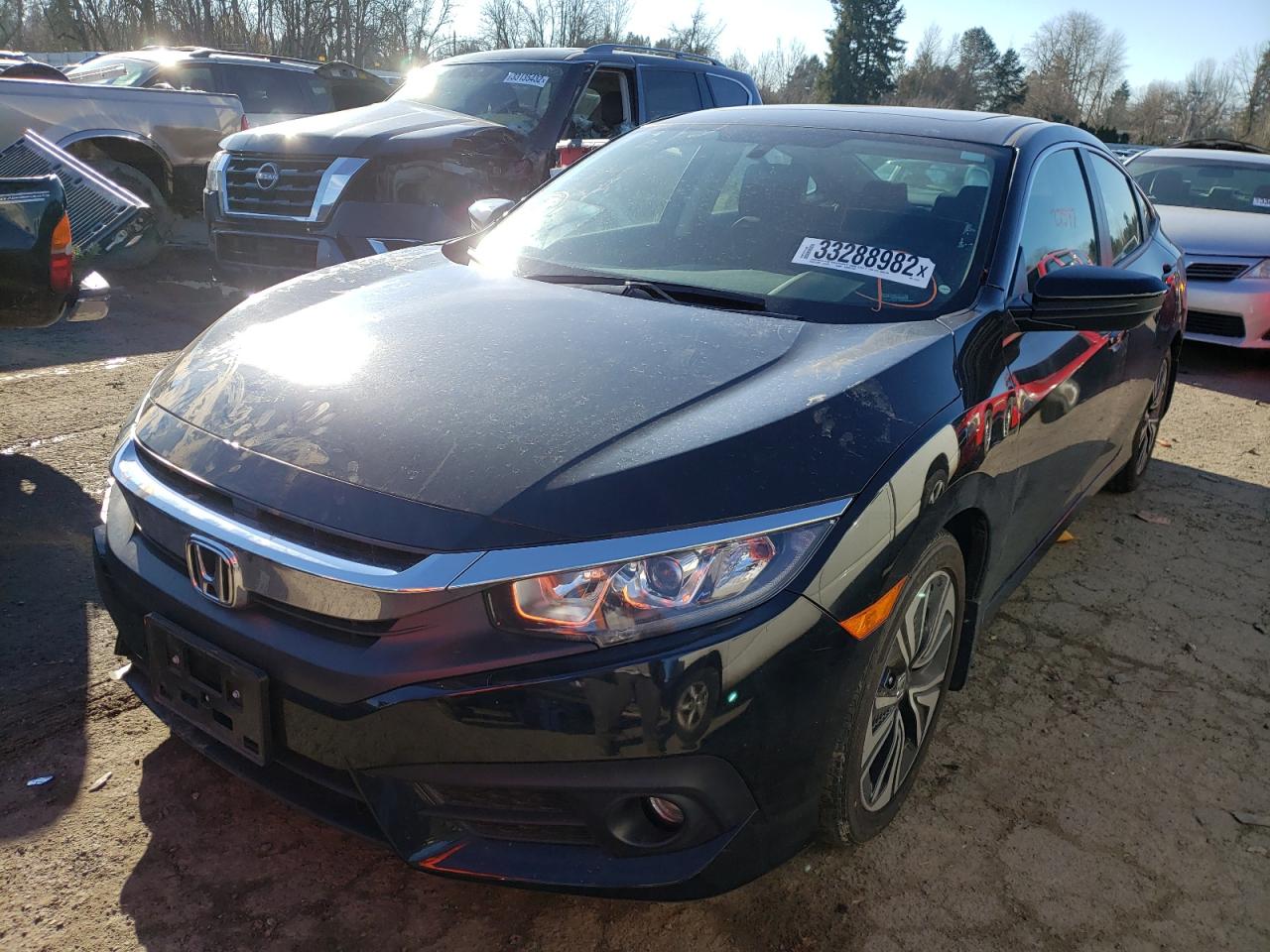 Photo 2 from auction – 2018 HONDA CIVIC EX with VIN JHMFC1F36JX014291