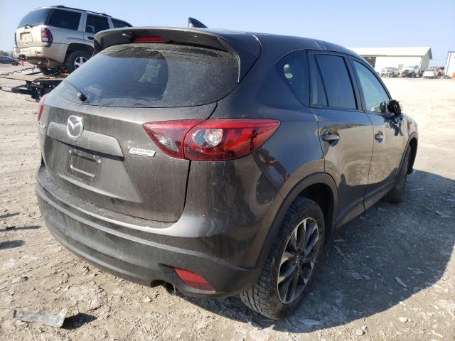 Photo 4 from auction – 2016 MAZDA CX-5 GT with VIN JM3KE2DYXG0916028