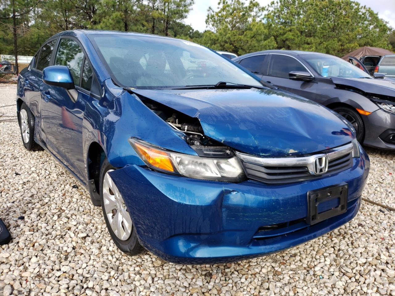 HONDA CIVIC LX 2012 with VIN 2HGFB2F55CH572881 - Photo from auction