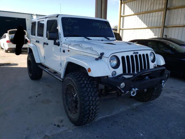 JEEP WRANGLER U 2015 with VIN 1C4BJWEG9FL628886 - Photo from auction