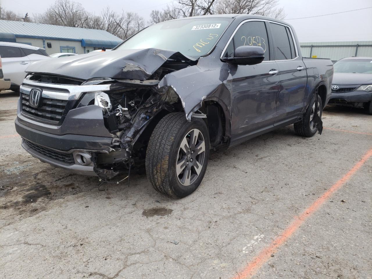Photo 9 from auction – 2018 HONDA RIDGELINE with VIN 5FPYK3F77JB007234