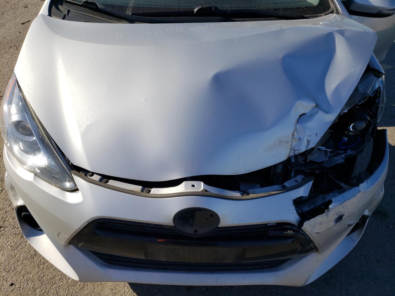 Photo 7 from auction – 2015 TOYOTA PRIUS C with VIN JTDKDTB31F1101640