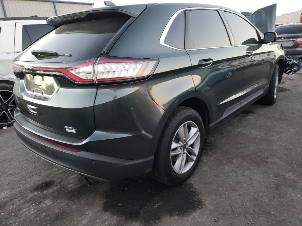 Photo 4 from auction – 2015 FORD EDGE SEL with VIN 2FMTK3J98FBB13011