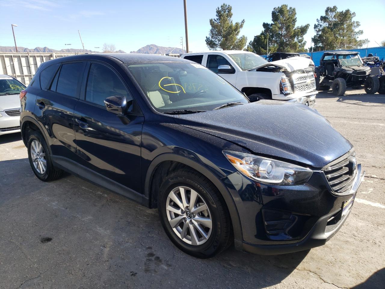 Photo 1 from auction – 2016 MAZDA CX-5 SPORT with VIN JM3KE2BY0G0883365