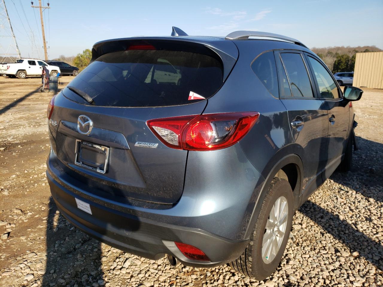 Photo 4 from auction – 2016 MAZDA CX-5 TOURI with VIN JM3KE2CY1G0827241