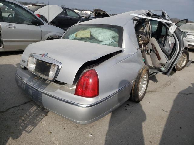 Photo 4 from auction – 2002 LINCOLN TOWN CAR E with VIN 1LNHM81W42Y627129