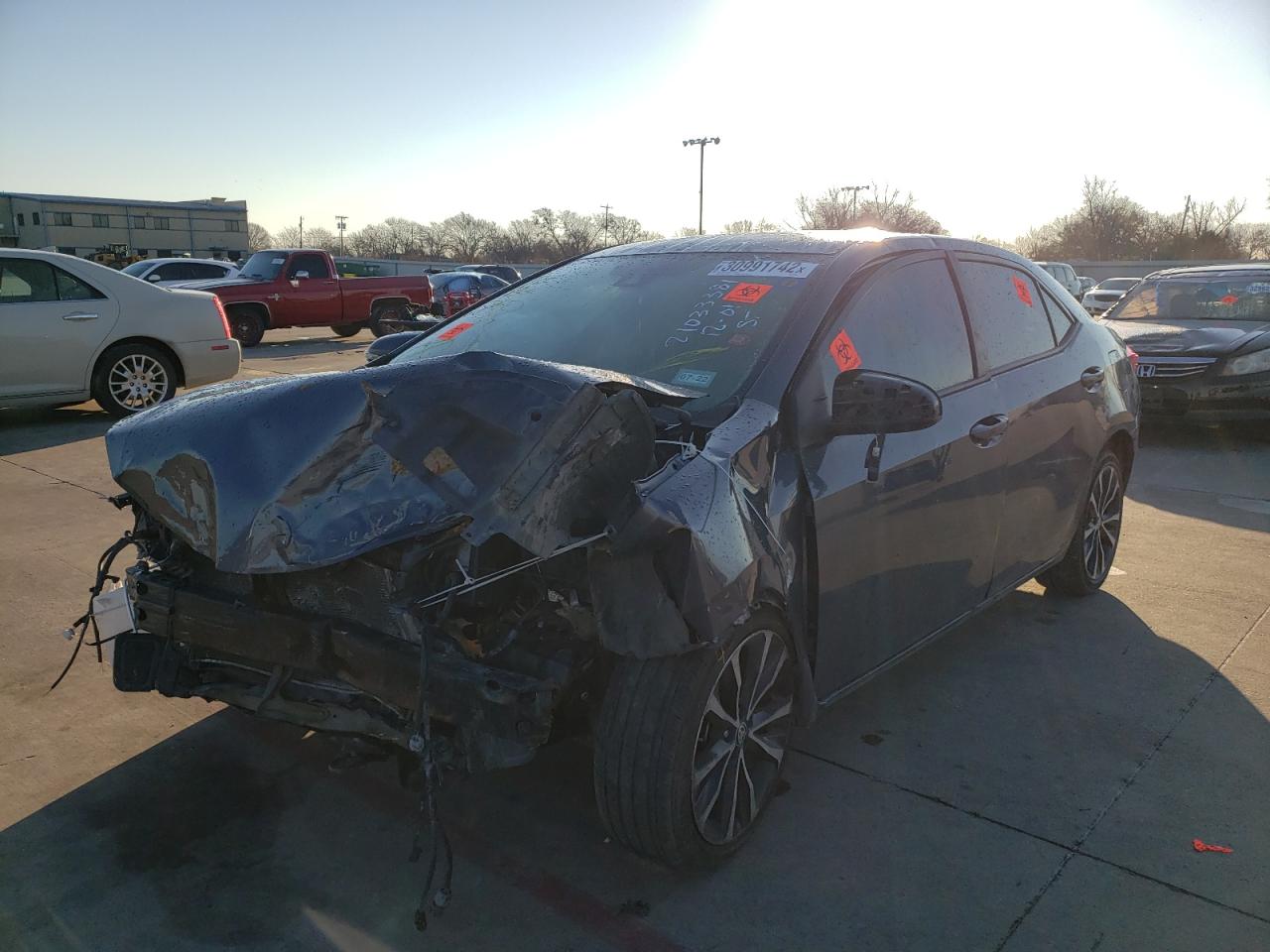 Photo 2 from auction – 2017 TOYOTA COROLLA L with VIN 5YFBURHE7HP673340