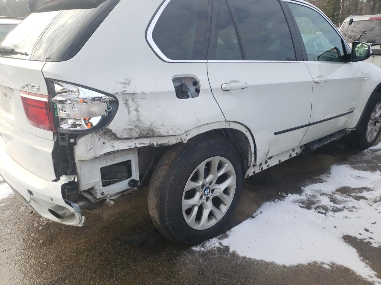 Photo 9 from auction – 2013 BMW X5 with VIN 5UXZV4C58D0B19557