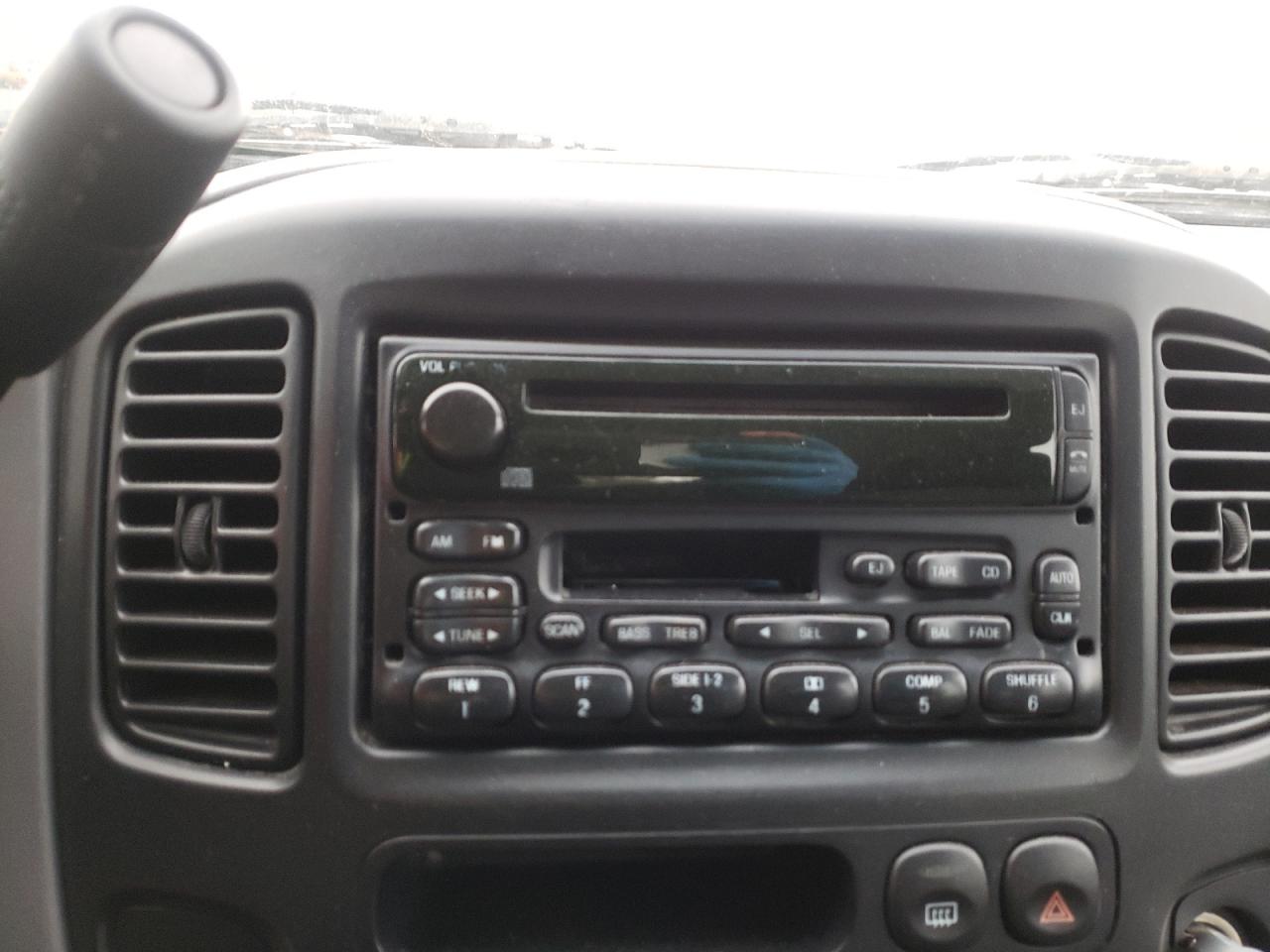 Photo 10 from auction – 2003 FORD ESCAPE XLS with VIN 1FMYU02103KA71989
