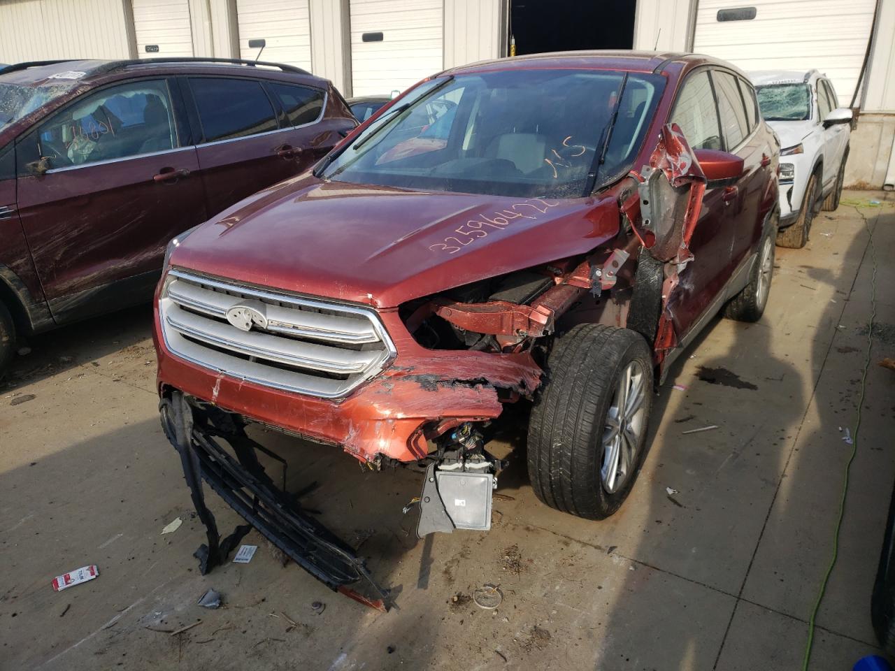 Photo 2 from auction – 2019 FORD ESCAPE SE with VIN 1FMCU0GDXKUB99317